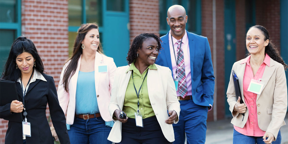 educators walking around campus