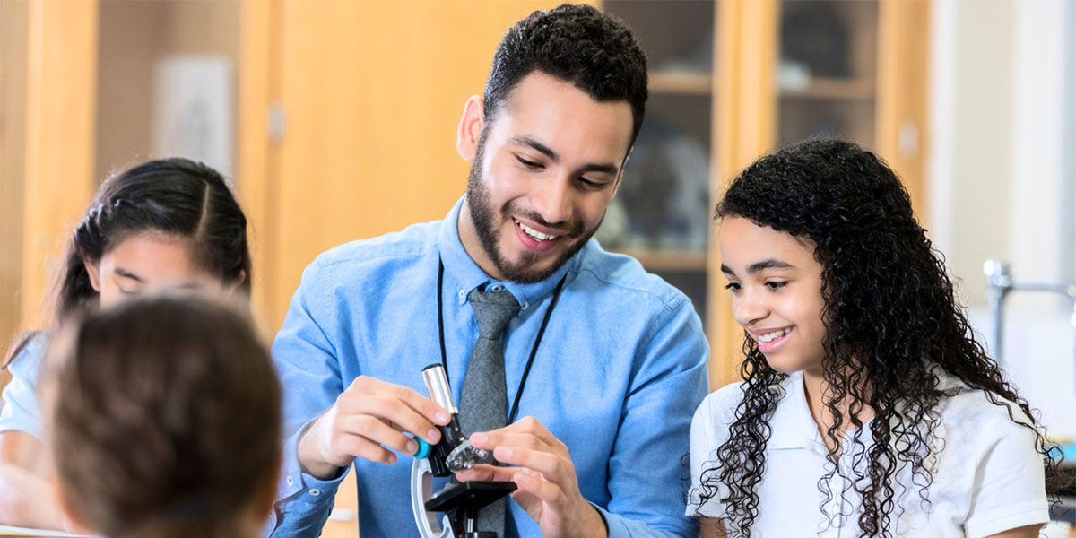 teacher and student working together