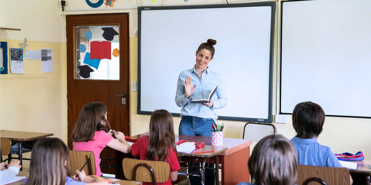 teacher in front of classroom