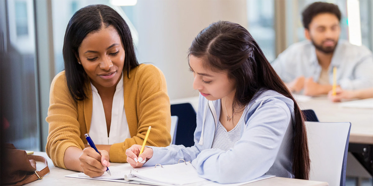 teacher and student working together