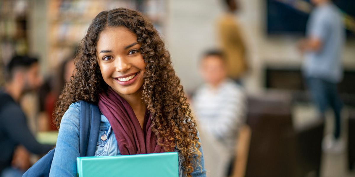 student smiling at school